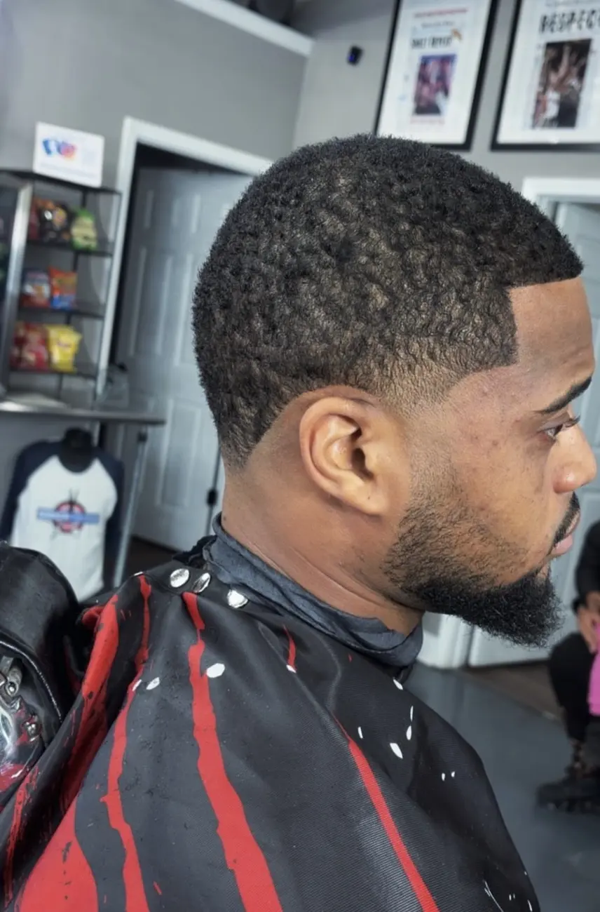 Wave cut with a crisp front corner and beard blend